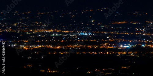 Night panorama of an Italian city in Tuscany photo