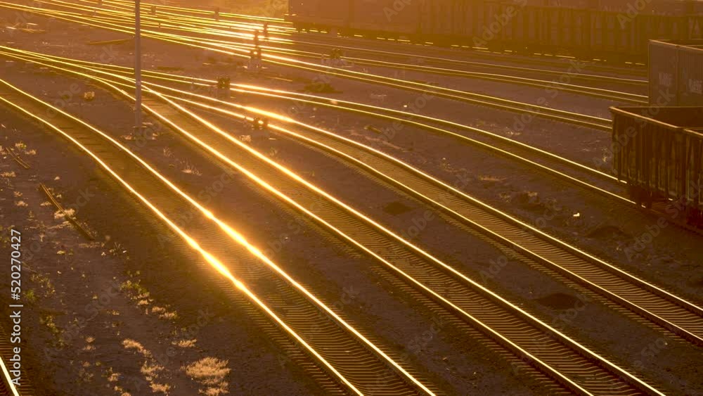 Railway freight transport marshalling yard at sunset Railway freight transport marshalling yard at sunset