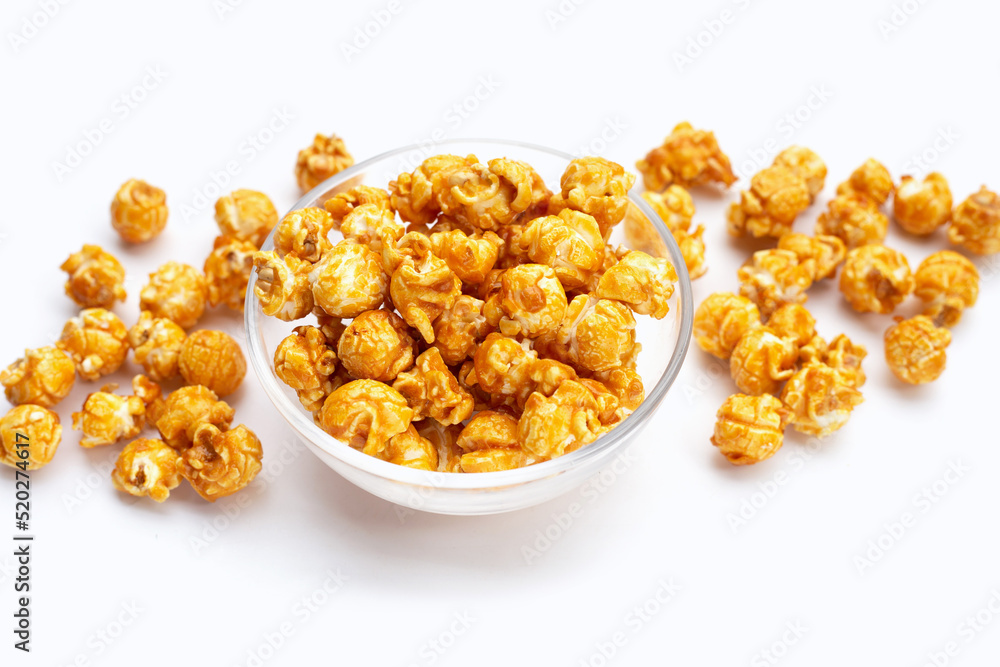 Honey caramel popcorn on white background. Honey caramel popcorn on white background.