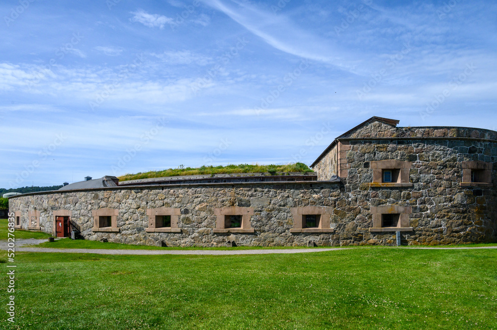 Historic Oscarsborg Fortress on a sunny day, Drøbak Sound, Norway
