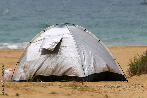 Tent for rest on the shores of the Mediterranean Sea.