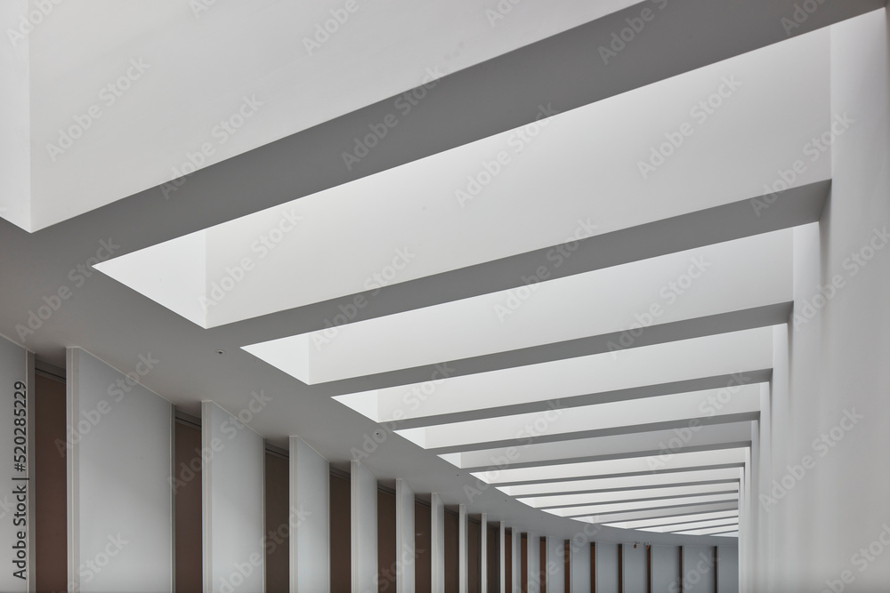 Fototapeta premium Minimal White Colonnade with Shadows, Modern Architectural Perspective