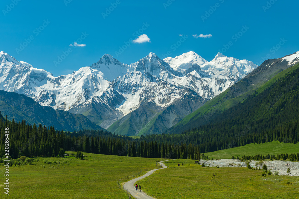 A road to the snow mountain. View of Xiata National Park in summer season.