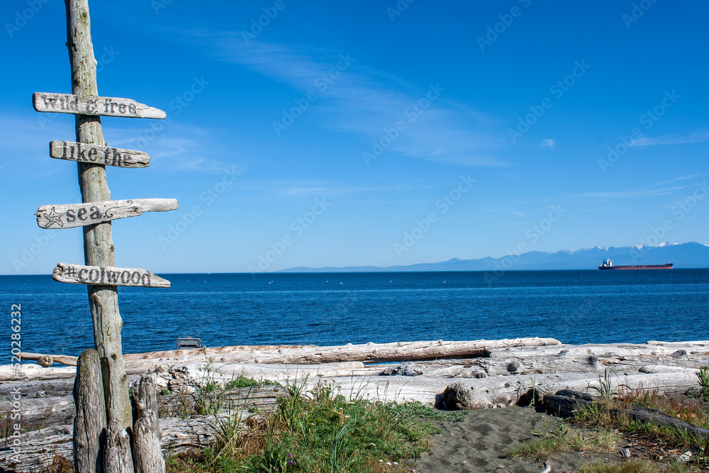 Sign on the beach in Esquimalt Lagoon, Colwood, British Columbia