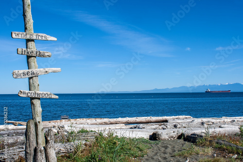 Sign on the beach in Esquimalt Lagoon, Colwood, British Columbia photo