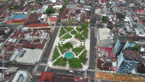 Aerial 4k video of Iquitos, Peru, and its Plaza de Aramas.  The city is also known as the Capital of the Peruvian Amazon.  It is the largest city in the world that is not reachable by road. photo