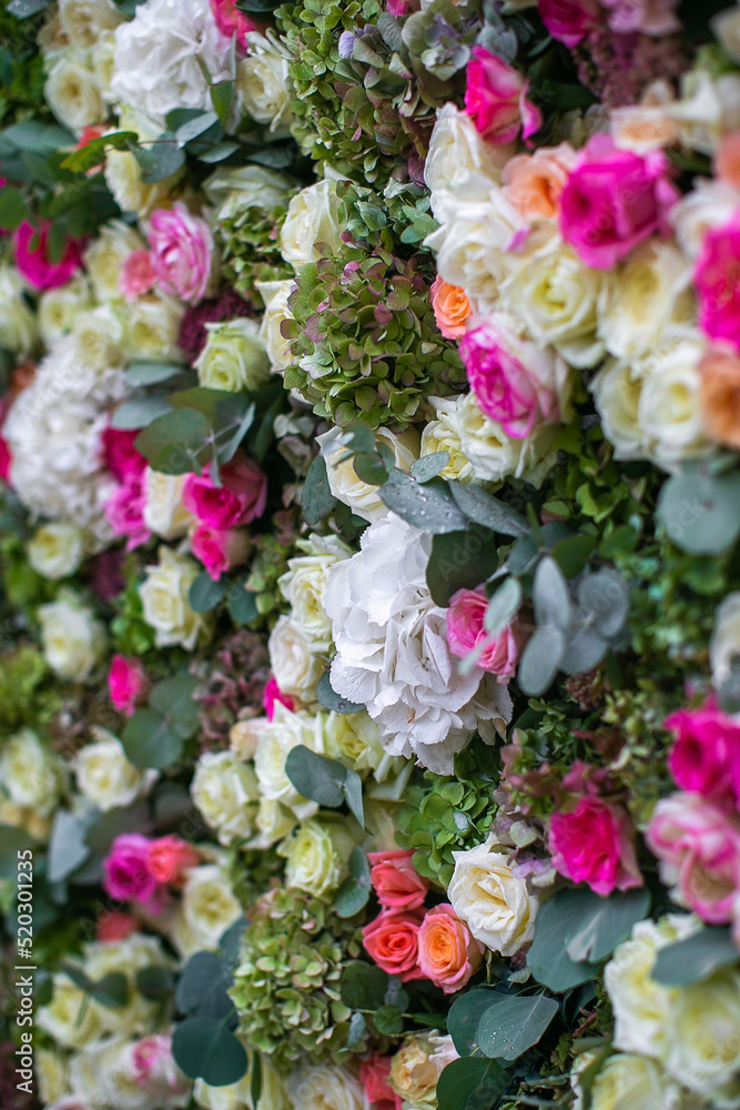 Flowers on the arch for the wedding ceremony