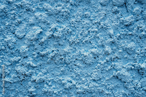 Blue or pastel plaster wall surface  abstract painted background  close-up  outdoor  blur  spot focus 