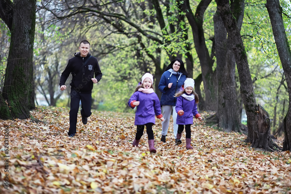 Leaf fall in the park. Children for a walk in the autumn park. Family. Fall. Happiness. Leaf fall in the park. Children for a walk in the autumn park. Family. Fall. Happiness.
