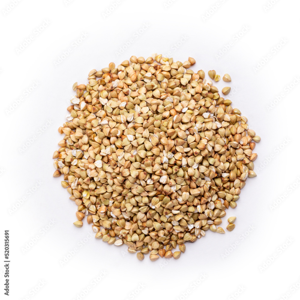 Pile of buckwheat seeds isolated on white background, closeup. Pile of buckwheat seeds isolated on white background, closeup.