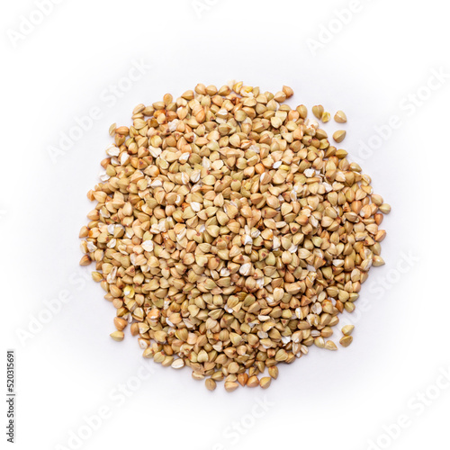 Pile of buckwheat seeds isolated on white background, closeup.