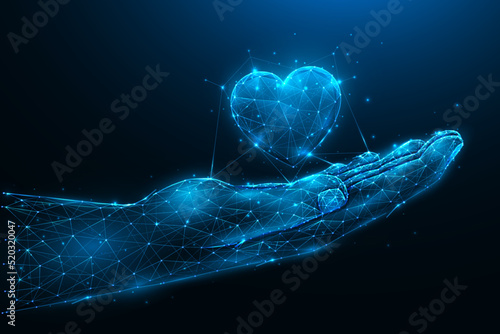 Charity or love concept. Abstract vector illustration of a hand palm with a heart symbol on a dark blue background. Heart transplant and organ donation concept low poly design.