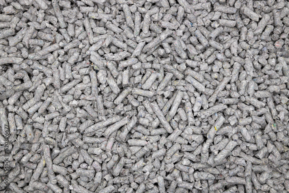 shallow depth of field photo of recycled Paper cat litter pellets shallow depth of field photo of recycled Paper cat litter pellets