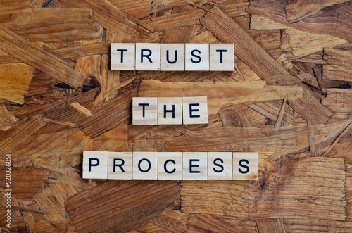 trust the process text on wooden square, motivation quotes photo