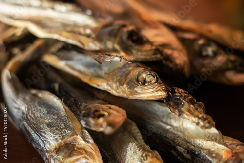 Dried fish to beer, selective focus close up