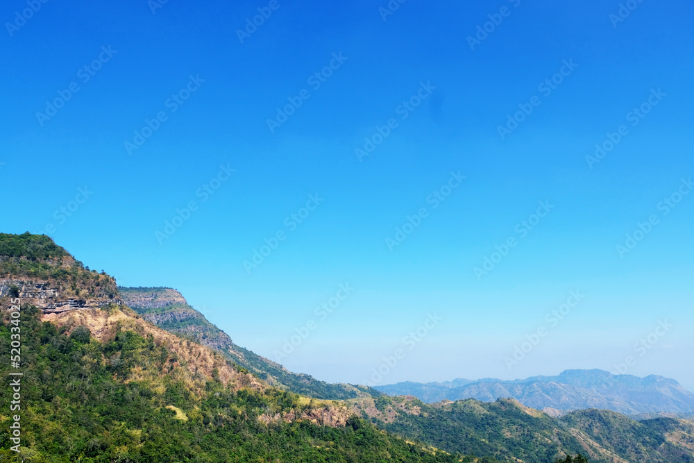 Mountain scape at Khao Kho National Park & Hot Springs in the morning at Phetchabun of Thailand in Winter, Sunny day and blue sky, Beautiful Natural View in Thailand, Natural wallpaper and background