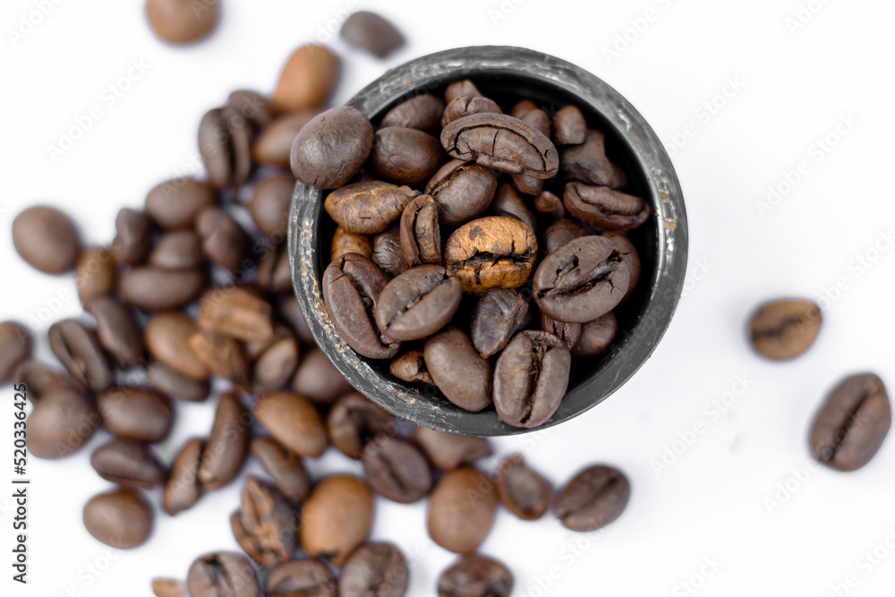 coffee beans vs in capsules,pods.roasted brown coffee beans in heart
