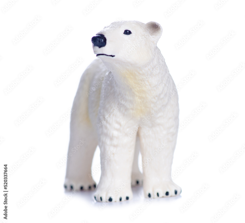 Figurine small white bear on white background isolation Figurine small white bear on white background isolation