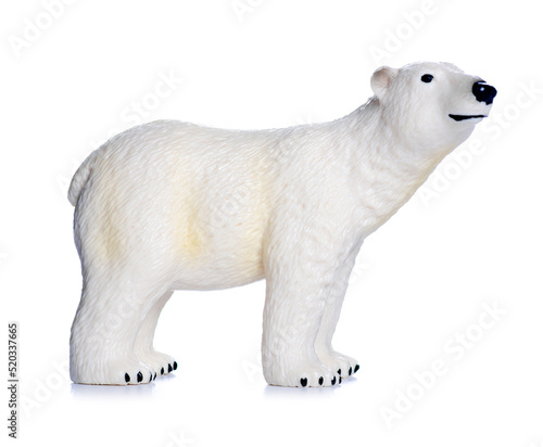 Figurine small white bear on white background isolation