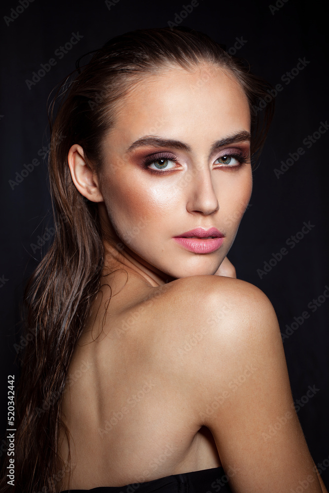Beauty woman portrait. Beautiful spa model girl with makeup. Youth and skin care concept. Black background. Beauty woman portrait. Beautiful spa model girl with makeup. Youth and skin care concept. Black background.