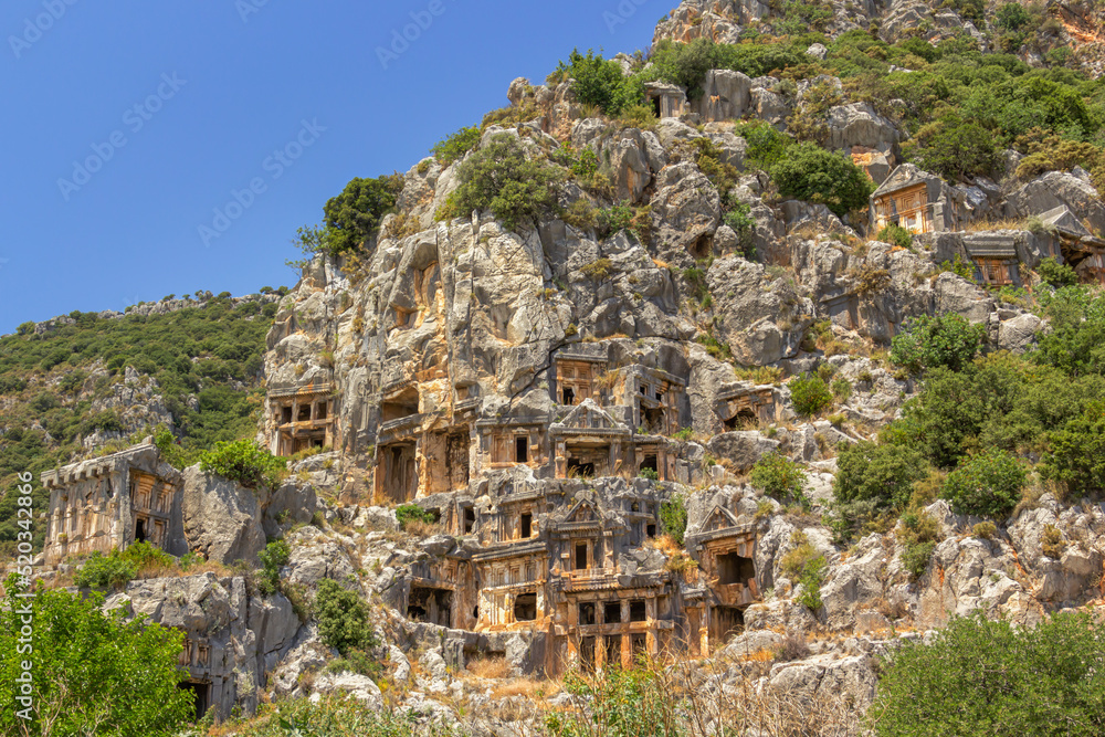 Lycian tombs of the city of the dead carved into the rocks on the Anatolian coast of Turkey near the city of Demre