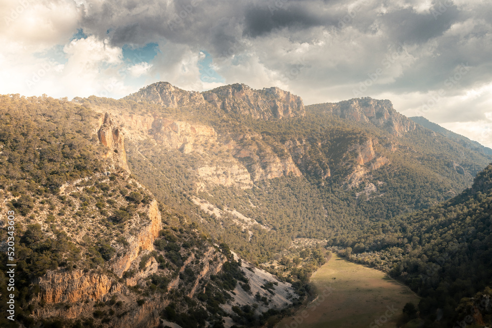 Landscape of the mountain of Otiñar in Jaén bathed by the summer sun rays.