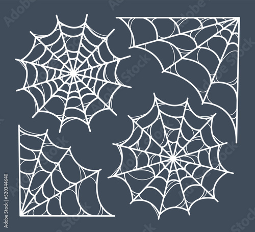 Set of spiderwebs. Symbol of Halloween. Variety of white spiderwebs on dark background. Template for your design. Hand drawn trendy vector illustration. All elements are isolated.