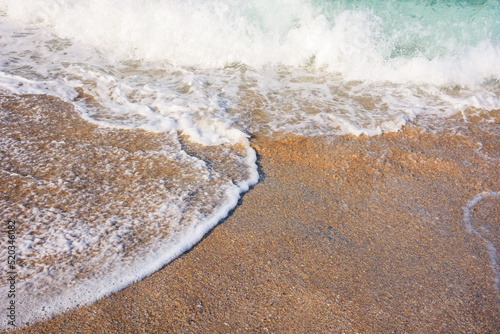 Foto close up of low tide at the sandy beach