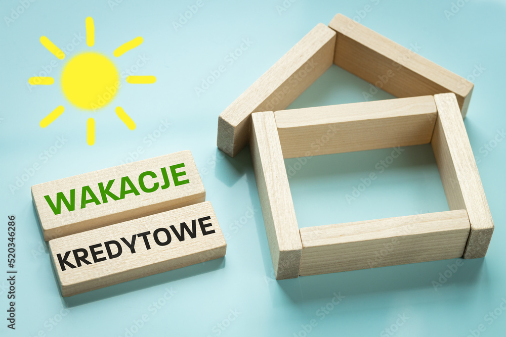 Wakacje Kredytowe text in Polish denoting credit holidays, State program to help borrowers in Poland repay loans during the crisis, Creative concept, Home and written with blocks - obrazy, fototapety, plakaty 