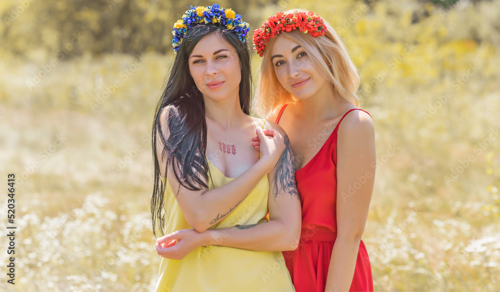 Women in ethnic dresses, flower wreath in hair. Concept of beauty Slavic women, Boho romantic style Women in ethnic dresses, flower wreath in hair. Concept of beauty Slavic women, Boho romantic style
