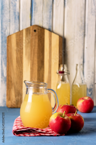 Healthy Organic Apple Juice in a Jug and Bottle Napkin Red Apples Vertical Harvest Autumn