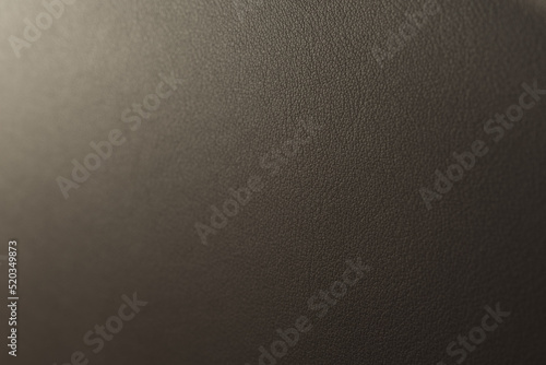 Closeup photo of supple dark brown furniture leather