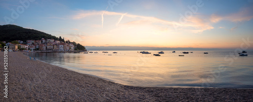 beautiful morning scenery at Moscenicka Draga beach sipar, adriatic ocean with boats photo