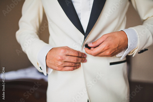 Groom in the morning during wedding preparations
