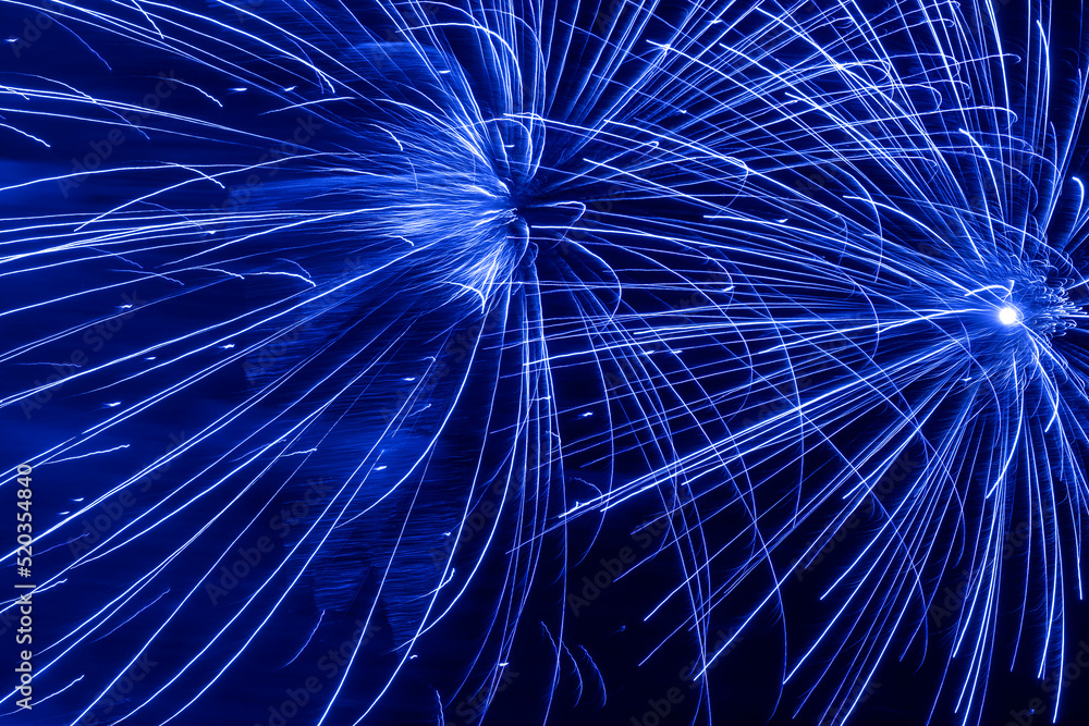 Naklejka premium abstract blue holiday fireworks background