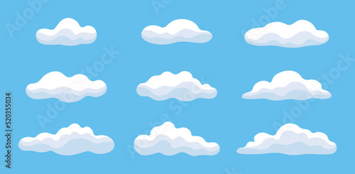 Set of clouds isolated on blue background. Vector illustration. Cute cartoon clouds