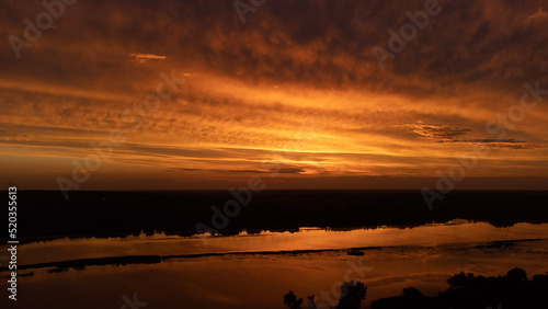 sunset over the lake © Karol.Rydz
