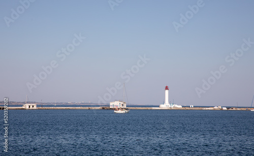 lighthouse in the port © Maqqerso