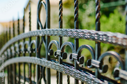 Patterned forged metal gates. Close-up