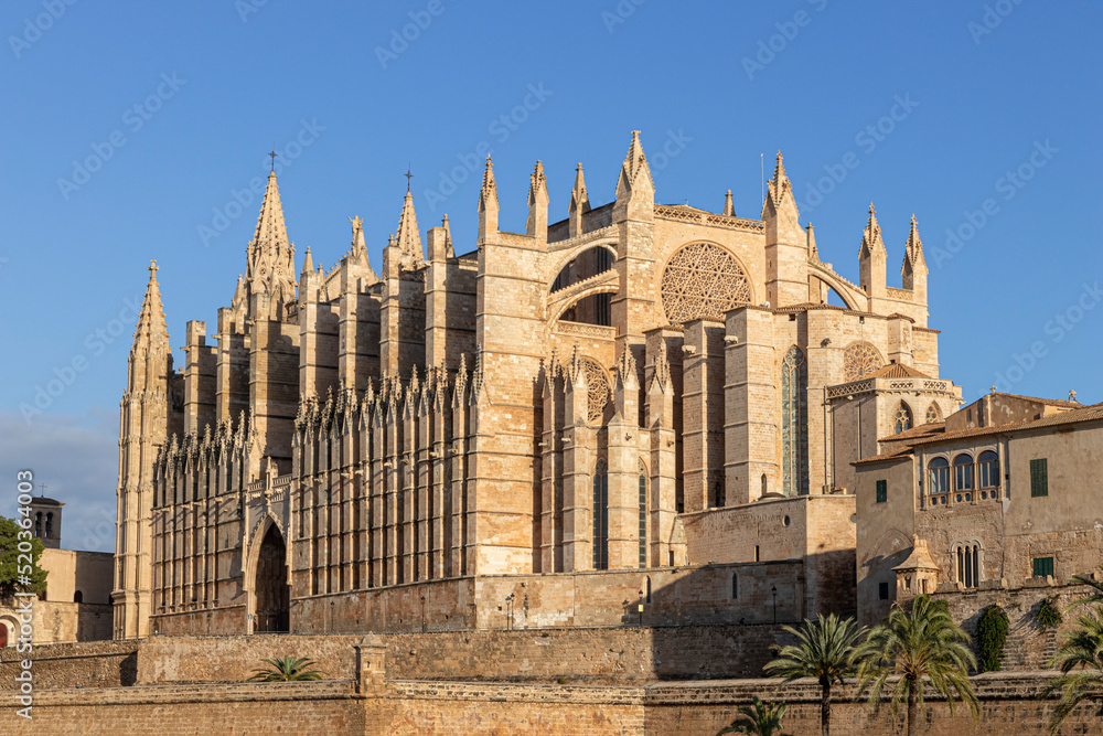 Palma de Mallorca, Spain. Facade and rose window called Ojo del Gotico (Gothic Eye) of the Santa Maria Cathedral Palma de Mallorca, Spain. Facade and rose window called Ojo del Gotico (Gothic Eye) of the Santa Maria Cathedral