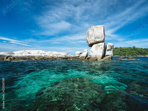 Scenic view of Koh Hin Sorn Island. Stunning rock stacking surround with crystal clear turquoise sea water with coral reef. Near Koh Lipe Island, Tarutao National Marine Park, Satun, Thailand.