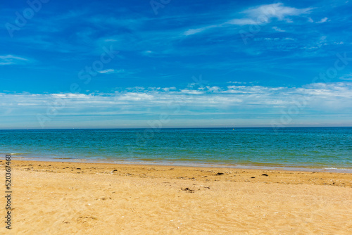 Fototapeta Naklejka Na Ścianę i Meble -  Strandspaziergang am französischen Küstenabschnitt Gold Beach zwischen La Rivière und Longues-sur-Mer - Normandie - Frankreich