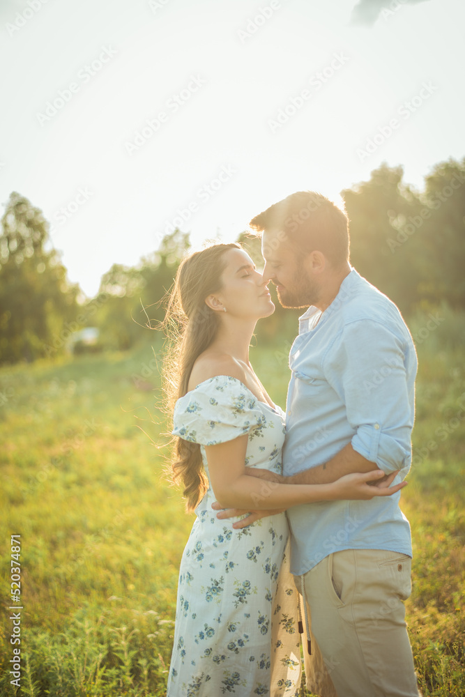 woman and bearded man on field nature picnic woman and bearded man on field nature picnic