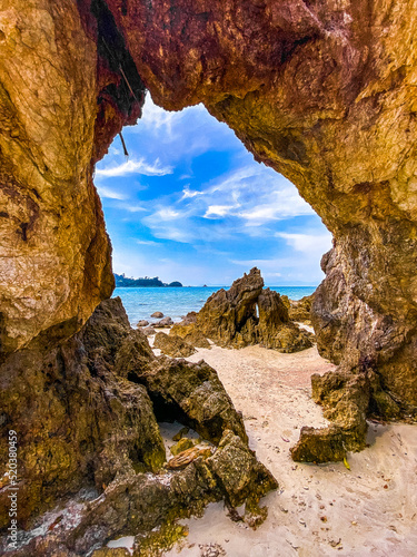 Koh Phayam beach Hin Talu with rock arch formation in Ranong, Thailand. © pierrick