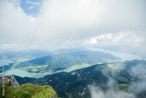 Amazing view from Schafberg by St. Sankt Wolfgang im in Salzkammergut  Haus house Schafbergspitze  lake Mondsee  Moonlake. Blue sky  alps mountains. Upper Austria  Salzburg  near Wolfgangsee  lakes