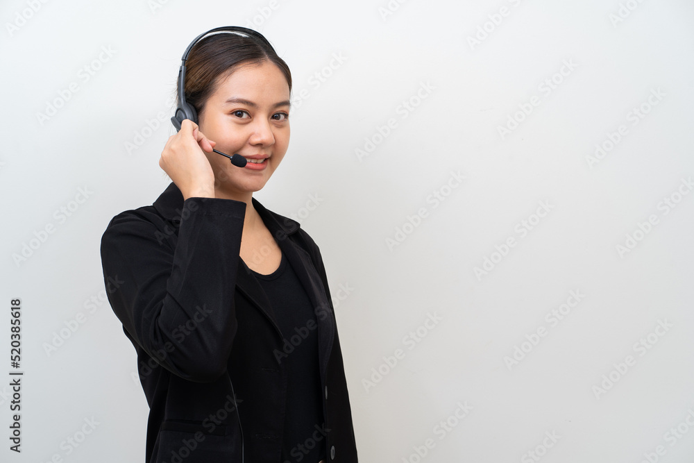 Asian woman wearing headphone on white background. Customer service CSR business concept. Asian woman wearing headphone on white background. Customer service CSR business concept.