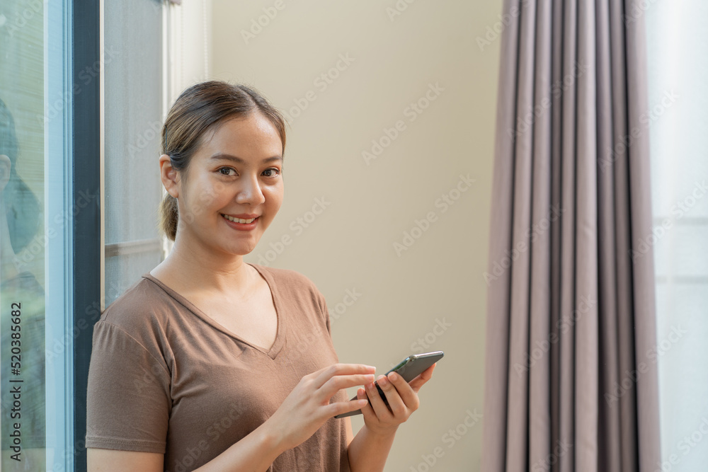 Asian woman using mobile phone. Business online social media concept. Asian woman using mobile phone. Business online social media concept.