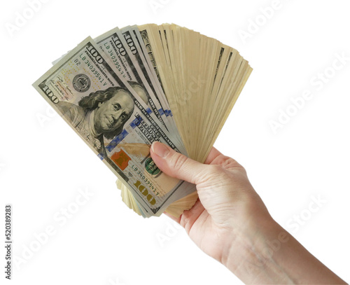 hand holding of big stack of dollars different money isolated on white background. money cash