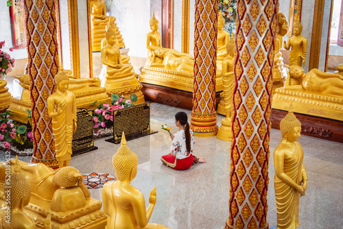 Photography Beautiful Asian girl at big Buddhist temple dressed in traditional costume