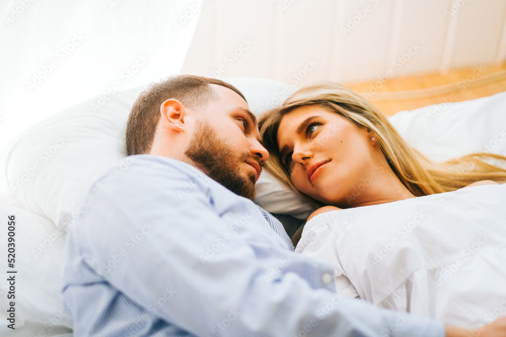 Future mother and father clasped pregnant big tummy. husband hugs pregnant wife. Happy family resting at home Future mother and father clasped pregnant big tummy. husband hugs pregnant wife. Happy family resting at home